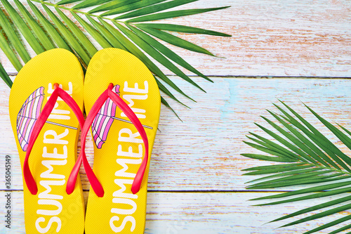 Summer vacation concept  on wooden background. photo