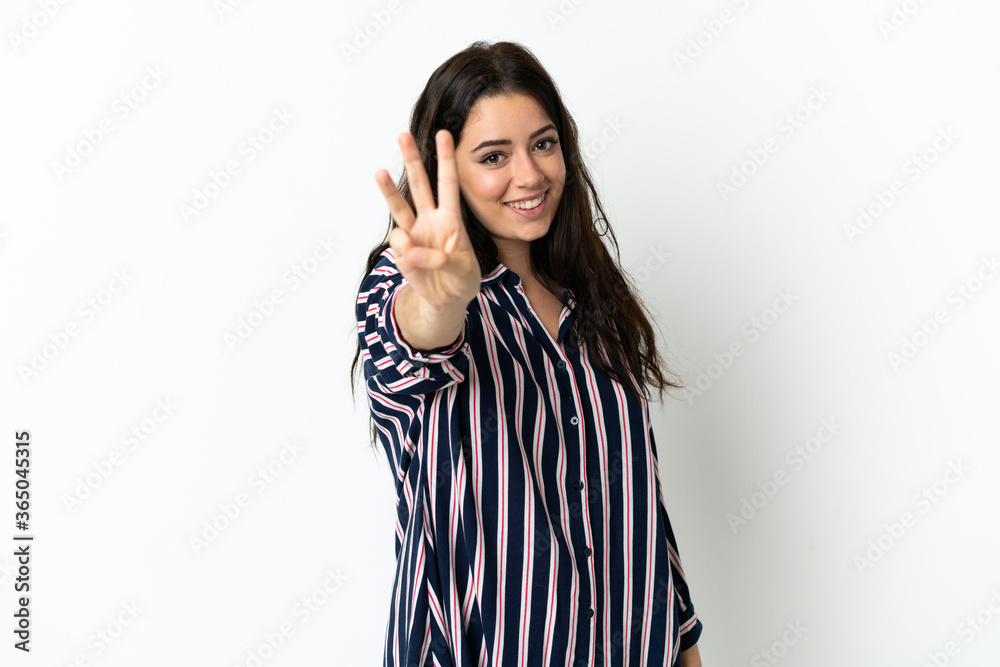 Young caucasian woman over isolated background happy and counting three with fingers Young caucasian woman over isolated background happy and counting three with fingers