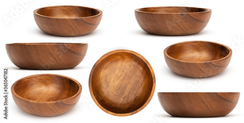 Empty wooden bowls isolated on white background. Set of wood bowls. Collection.