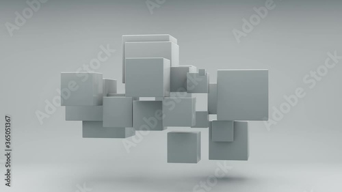 Abstract 3D animation of a white cube that splits into many small cubes in zero gravity. The cubes change size, but then the geometry and shape are restored.