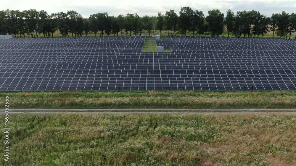 Flying over a field of solar panels Flying over a field of solar panels