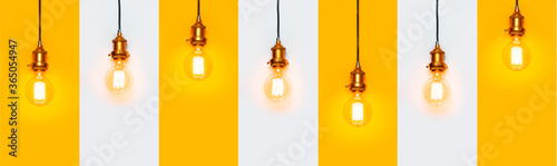 Creative idea concept, designer lamp, modern interior item. Vintage fashionable edison lamp on gray and yellow background. Top view flat lay. Lighting, electricity, pattern with lamp bulb
