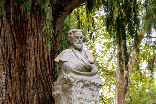 Фотография Adolfo Becquer - A close-up view of the bust of the Spanish Romanticist poet Gustavo Adolfo Dominguez Becquer (1836-1870) at Becquer Monument in Maria Luisa Park, Seville, Andalusia, Spain