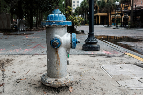 Fire Hydrant Downtown City Sidewalk In Blue