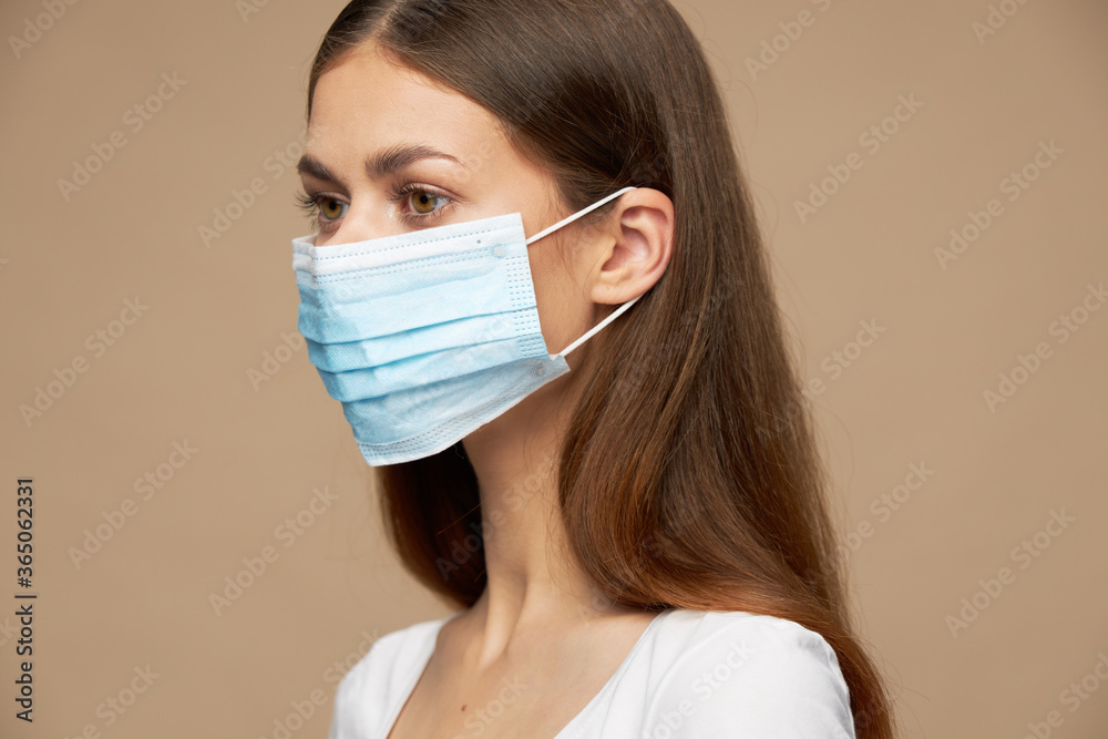 Model fashion clothes in a medical mask health i Model fashion clothes in a medical mask health i