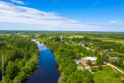 The village of Krasnoarmeyskoye, Shuisky district, Ivanovo region on the Teza river on a summer day.