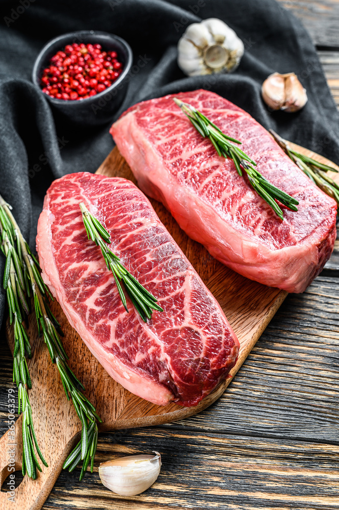 marbled beef steak, top blade meat Black background. view Stock-foto Adobe Stock