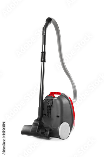 Modern red vacuum cleaner isolated on white