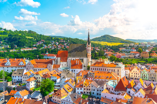 Panoramic view of Cesky Krumlov with St Vitus church in the middle of historical city centre. Cesky Krumlov, Southern Bohemia, Czech Republic photo