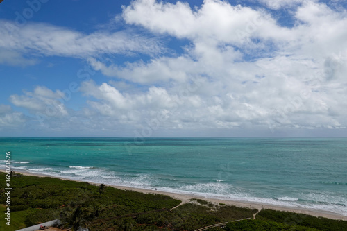 An aerial view of the turquoise blue water of the Atlantic Ocean