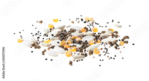 Mix of vegetable seeds on white background