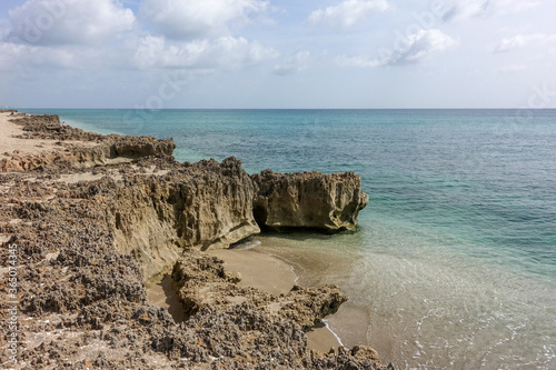 A rocky beach with clear turquoise water in Stuart, FL