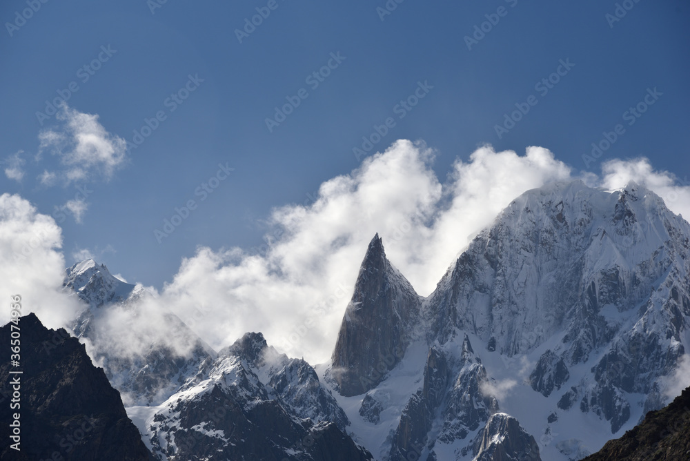 snowy mountain top in Gilgit-Baltistan, Northern Area, Kashmir, Pakistan. One of rld's longest glaciers mountain range