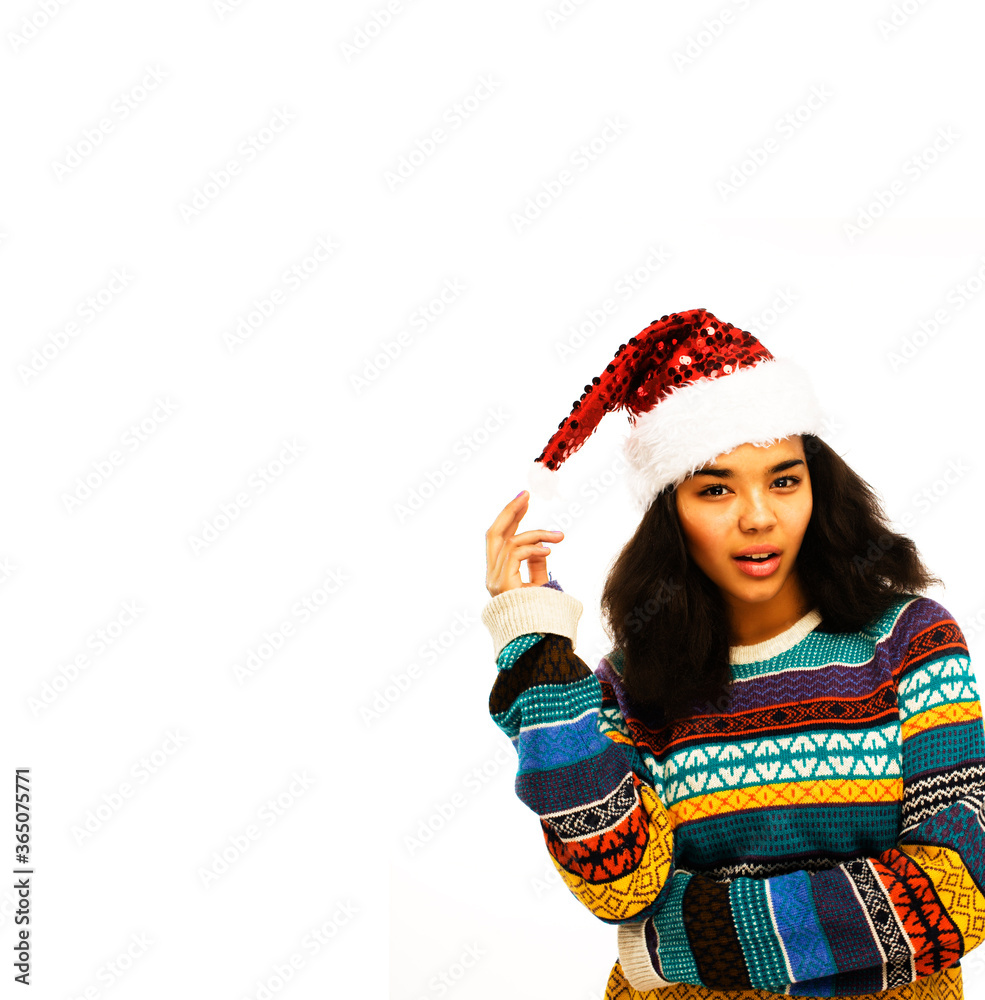 cute young girl in santas red hat isolated
