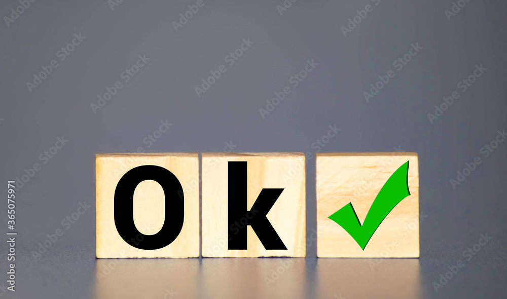Word ok made of wooden cubes on a white background Word ok made of wooden cubes on a white background