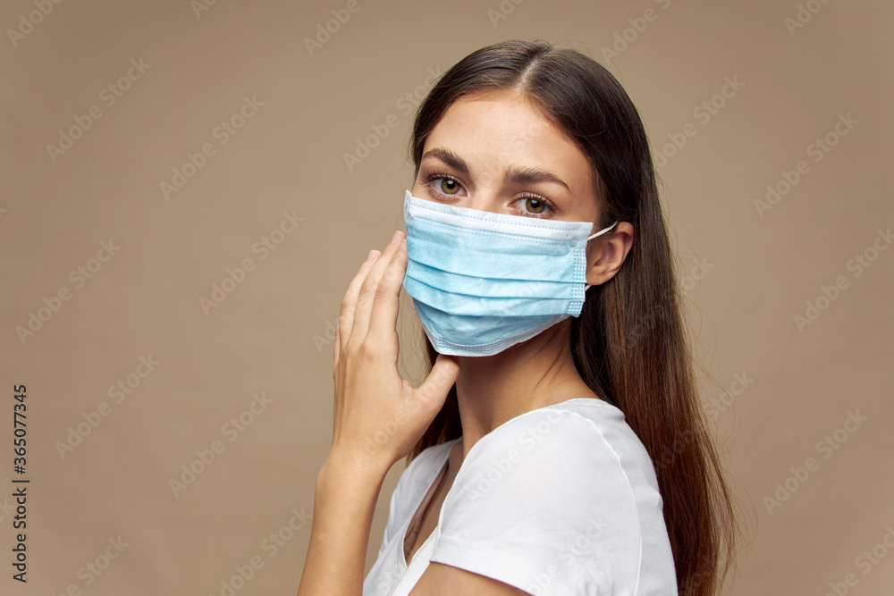 Beautiful girl stylish clothes in a medical mask health Beautiful girl stylish clothes in a medical mask health