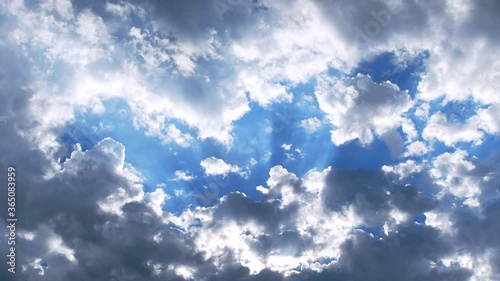 Blue Sky with Sun Ray Clouds