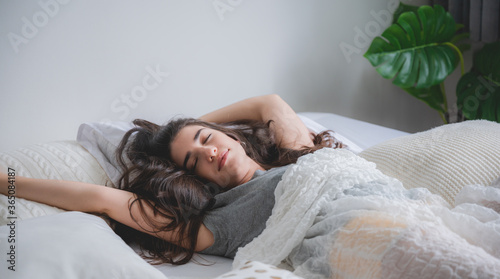 Pretty young woman relaxing...