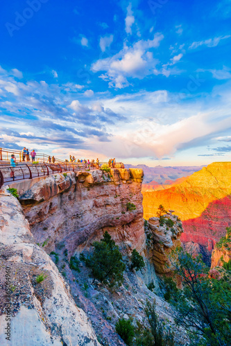 Panoramic image of the colorful Sunset on the Grand Canyon in Grand Canyon National Park from the south rim part,Arizona,USA, on a sunny cloudy day with blue or gloden sky