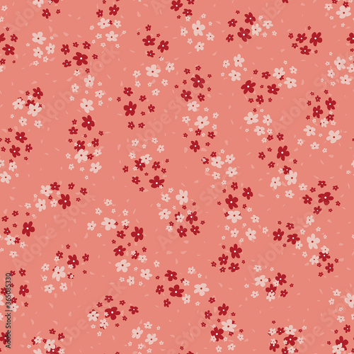 Vector seamless pattern with small scattered pink and red flowers. Elegant minimal floral background. Simple ditsy texture. Liberty style wallpapers. Repeat design for print, decor, fabric, clothing