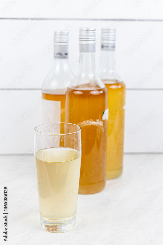 Homemade Elderberry Syrup in the bottles with copy space