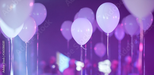 decorating the holiday concept are white beads like people in blue and pink 