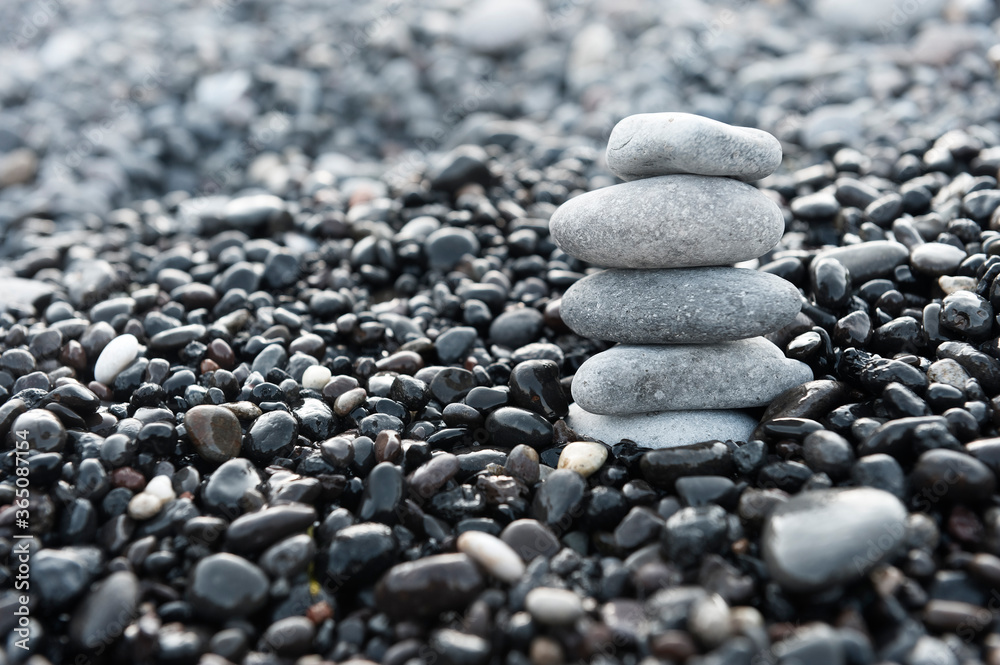 Stones pyramid on the beach. Zen and harmony concept. Stones pyramid on the beach. Zen and harmony concept.
