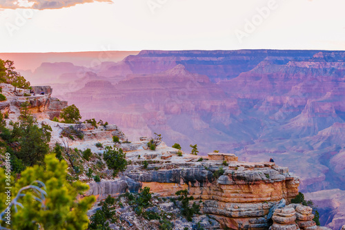 Panoramic image of the colorful Sunset on the Grand Canyon in Grand Canyon National Park from the south rim part,Arizona,USA, on a sunny cloudy day with blue or gloden sky photo