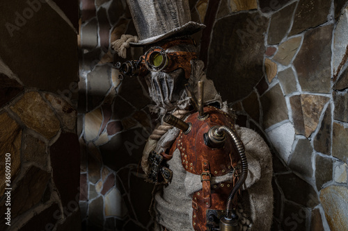 Futuristic character cyborg stalker. Art Photography in steampunk style.