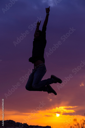 Young man, businessman jump happy sunset © hbrh
