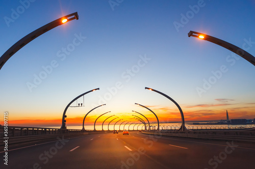 modern highway toll road at sunset