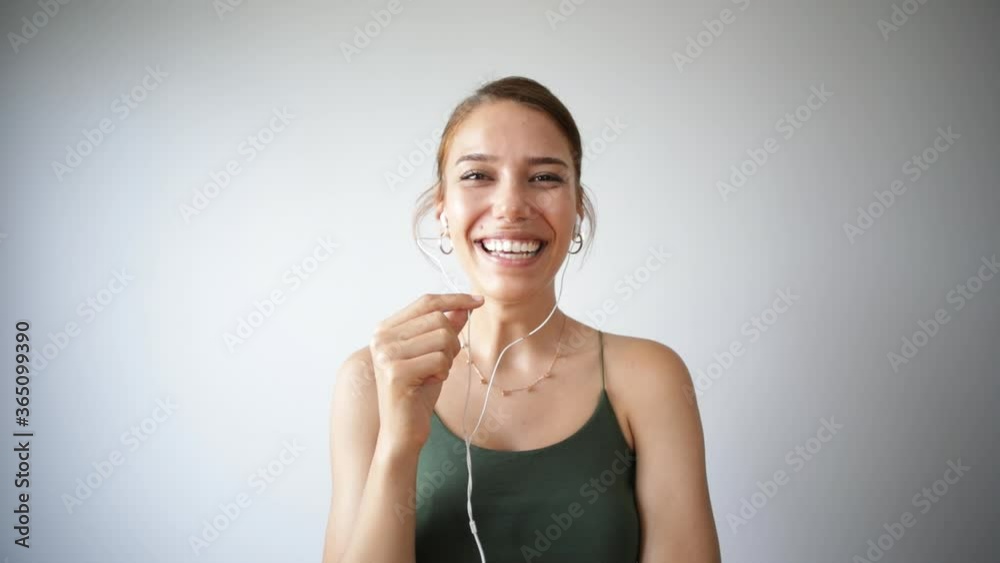young woman doing videoconference on mobile phone young woman doing videoconference on mobile phone