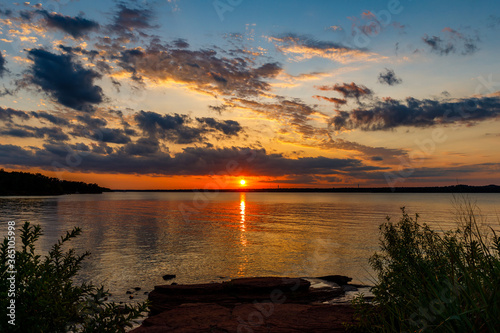 Sunset at the south dam area of Thunderbird lake. © crotonoil