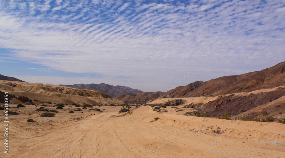 Naklejka premium The Pan de Azucar National Park in the Atacama Desert in the north of Chile is known for its desertic landscape and rolling hills.