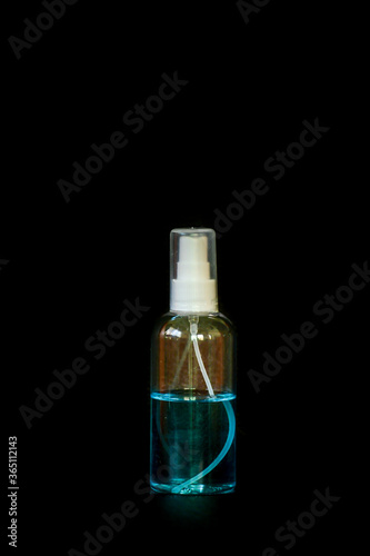perfume bottle isolated on black