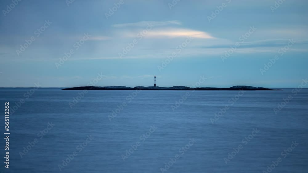 Timelapse of a lighthouse on a lonely island in the ocean Timelapse of a lighthouse on a lonely island in the ocean