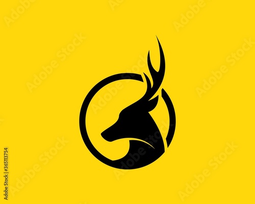 Simple abstract deer head inside the circle