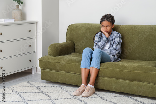 Sad African-American girl a...