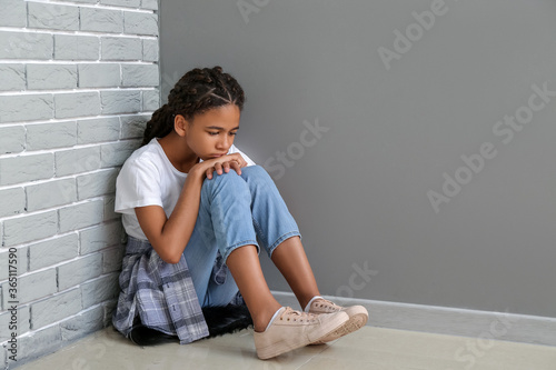 Sad African-American girl s...