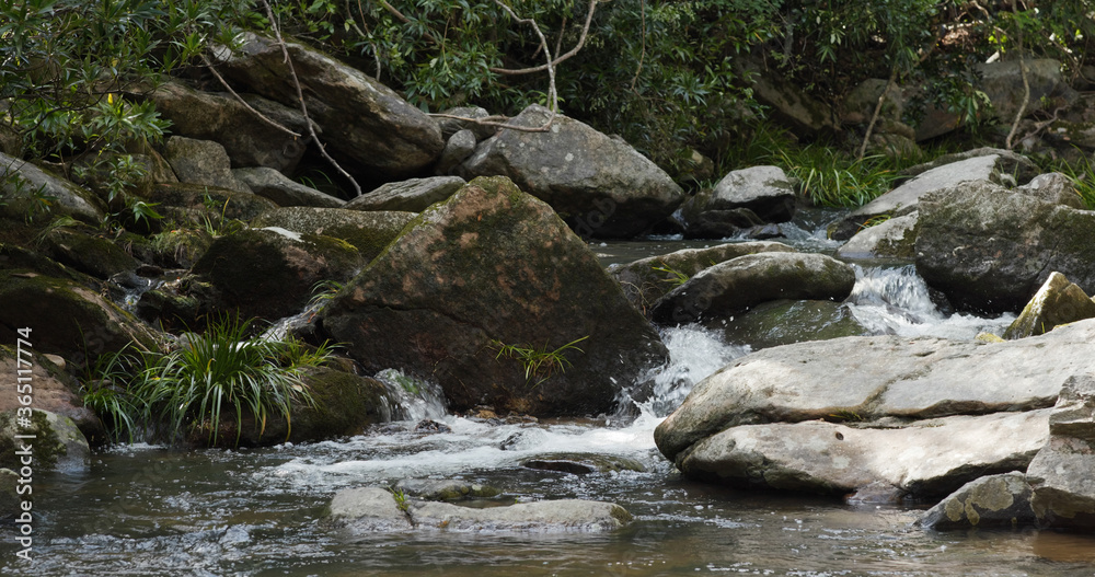 Fototapeta premium Water flows though the cascade