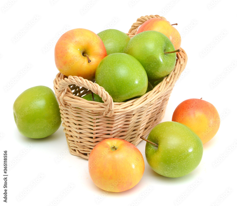 Red and green apples in basket on white background Red and green apples in basket on white background