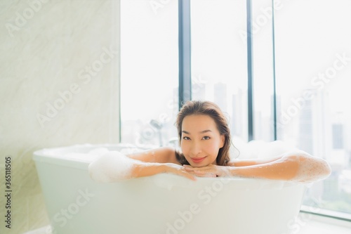 Portrait beautiful young asian woman relax and leisure in bathtub