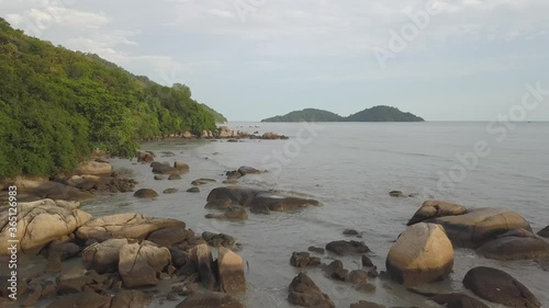 Aerial view fly at seashore at Permatang Damar Laut, Penang. photo