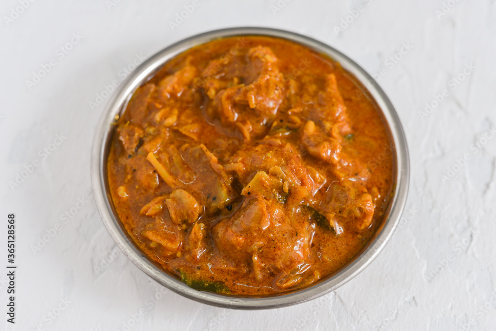 Dum Ka Murgh or Lagan Ka Murgh tikka slow cooked chicken hot and spicy curry dish Hyderabad, India. Popular South Indian non-vegetarian cuisine prepared using yogurt, tomato, Garam Masala. Dum Ka Murgh or Lagan Ka Murgh tikka slow cooked chicken hot and spicy curry dish Hyderabad, India. Popular South Indian non-vegetarian cuisine prepared using yogurt, tomato, Garam Masala.