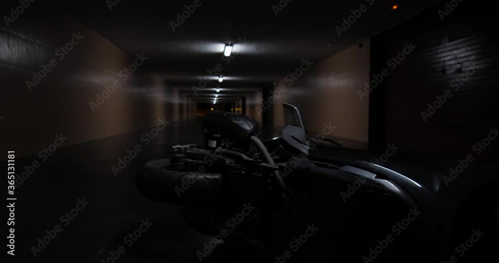 Accidental fall of a motorcycle in a tunnel. Motobyke accident concept. Accidental fall of a motorcycle in a tunnel. Motobyke accident concept.