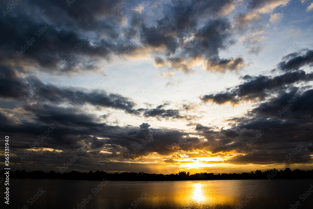 colorful dramatic sky with cloud at sunset