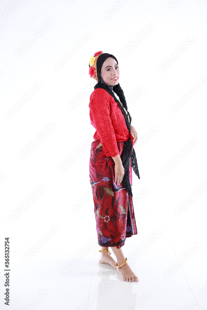 Beautiful smiling Asian girl wearing a set of modern traditional clothes, the traditional female outfits originated from Indonesia. Indonesian Women isolatedd white background Beautiful smiling Asian girl wearing a set of modern traditional clothes, the traditional female outfits originated from Indonesia. Indonesian Women isolatedd white background