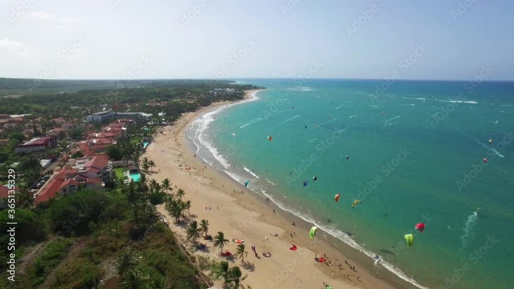 Scenic flight in cabarete with a blue sky and white sand watching the kitesurfing athletes Scenic flight in cabarete with a blue sky and white sand watching the kitesurfing athletes