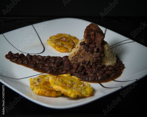 Rice with black beans and patacons photo