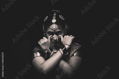 Bharatnatyam dancer closing eyes